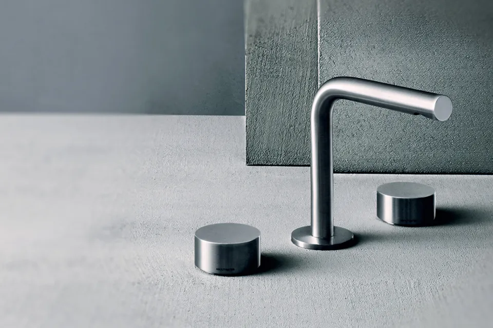 three-hole basin mixer in brushed steel with a right-angled spout