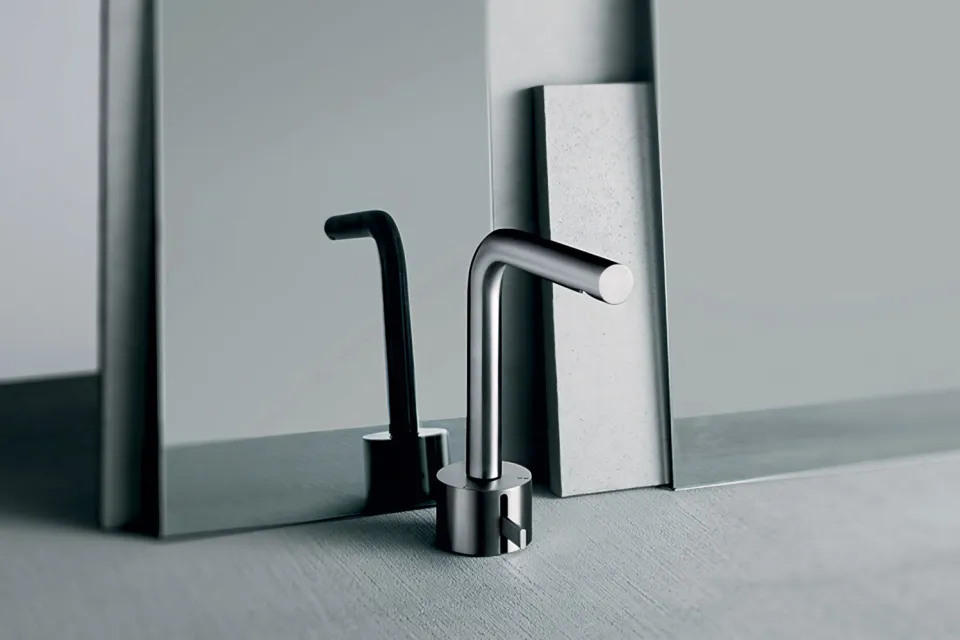 two-piece basin mixer with a tall bent spout and separate lever