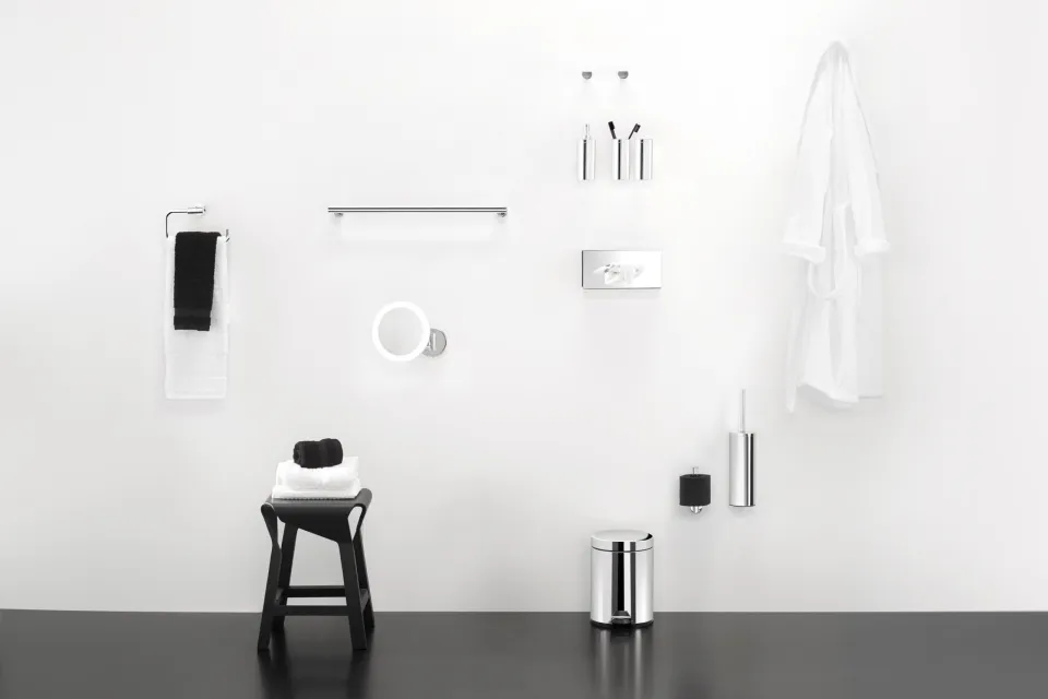 bathroom accessories on a white wall